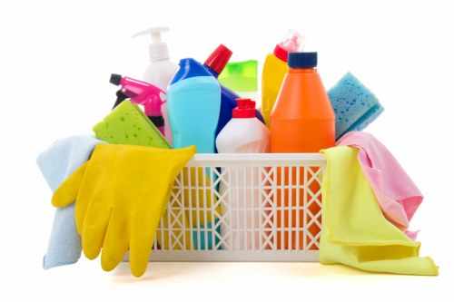 Professional cleaner maintaining a Marylebone home kitchen